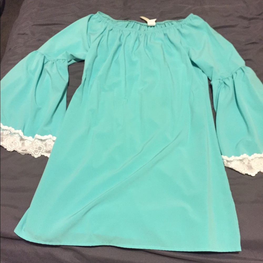 Seafoam green blouse with lace detail